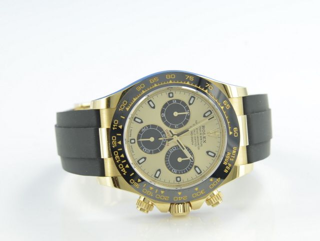 Rolex Cosmograph Daytona 40 Yellow Gold Rubber Strap Black & Champagne Dial 116518LN