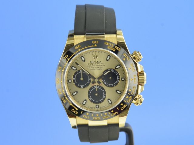 Rolex Cosmograph Daytona 40 Yellow Gold Rubber Strap Black & Champagne Dial 116518LN