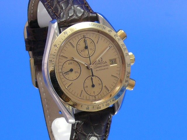 Omega Speedmaster Date Chronograph Stahl/Gold