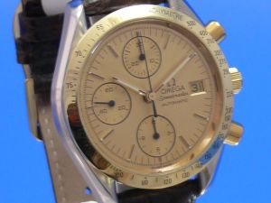 Omega Speedmaster Date Chronograph Stahl/Gold